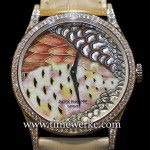 Patek Philippe “Common Pheasant” Ref. 5077/100R-014. This limited edition rose gold piece houses the Calibre 240 ultra-thin automatic movement and its yellow gold dial is decorated using champlevé and cloisonné enamel on a hand-guilloched background with hand-engraved feathers on top. The bezel and lugs are set with 113 diamonds (approx. 0.8 carats) and the prong buckle has 29 diamonds (approx. 0.22 carats). Photo: © TANG Portfolio. Timmy / Elfa. Photo taken with a Leica D-Lux 5