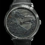 Blancpain “The Great Wave”, Métiers d’Art studio. Introduced in 2016, it houses the Calibre 13R3A manual-winding movement with 8 days of power reserve and features a silver-toned obsidian dial that is hand-decorated with hand-engraved gold waves, finished with rokushō lacquer. Photo: © TANG Portfolio. Elfa / Timmy. BaselWorld 2016.