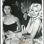 The caption that came with the above black and white photo was well-phrased: “Sophia Loren giving a disdainful ‘side eye’ to Jayne Mansfield’s dangerous décolletage.” Source: PRNewswire / Regency Superior Auctions.